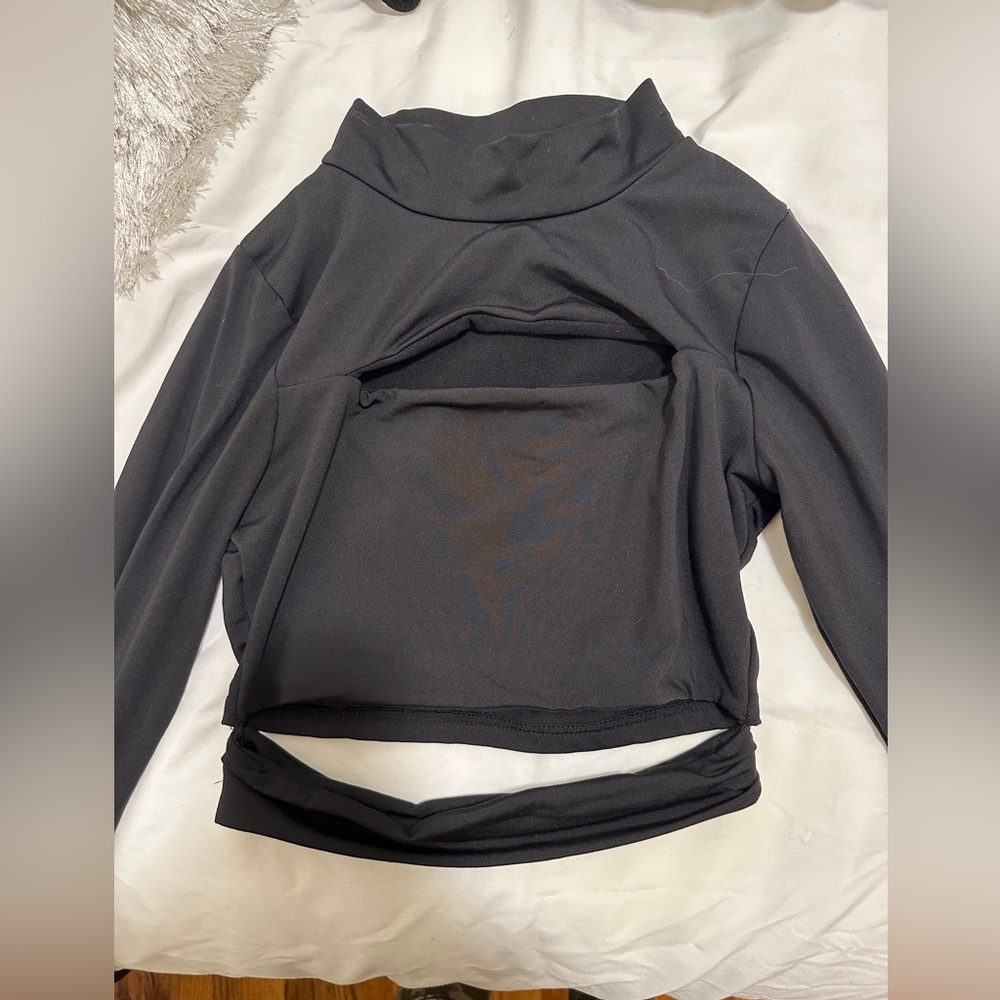 Long sleeve cropped shirt with cut outs on chest and stomach